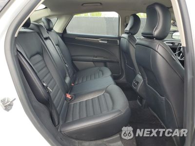 Zdjęcie 10 z 13 samochodu: 2017 FORD FUSION SE HYBRID VIN:3FA6P0LU2HR359548 - miniatura