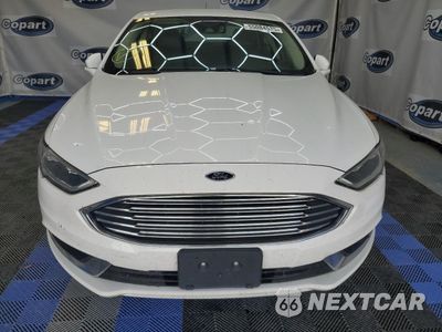 Piąte zdjęcie samochodu w środku: 2018 FORD FUSION SE HYBRID VIN:3FA6P0LU6JR163506 - miniatura