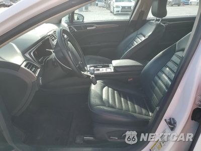 Zdjęcie 7 z 12 samochodu: 2017 FORD FUSION SE HYBRID VIN:3FA6P0LU6HR359598 - miniatura