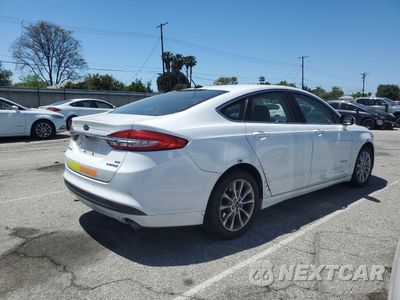Trzecie zdjęcie samochodu z tyłu: 2017 FORD FUSION SE HYBRID VIN:3FA6P0LU9HR408910 - miniatura