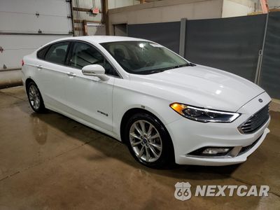 Czwarte zdjęcie samochodu z boku: 2017 FORD FUSION SE HYBRID VIN:3FA6P0LU8HR410132 - miniatura