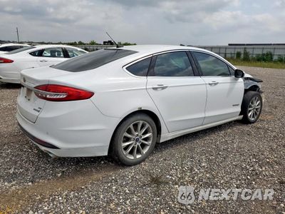 Trzecie zdjęcie samochodu z tyłu: 2017 FORD FUSION SE HYBRID VIN:3FA6P0LU4HR409026 - miniatura