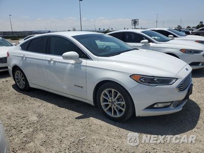 Czwarte zdjęcie samochodu z boku: 2017 FORD FUSION SE HYBRID VIN:3FA6P0LU8HR409711 - miniatura