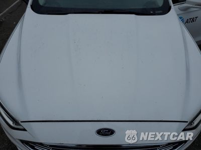 Zdjęcie 12 z 13 samochodu: 2017 FORD FUSION SE HYBRID VIN:3FA6P0LU6HR409691 - miniatura