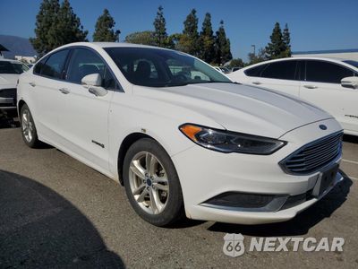 Czwarte zdjęcie samochodu z boku: 2018 FORD FUSION SE HYBRID VIN:3FA6P0LU2JR172123 - miniatura