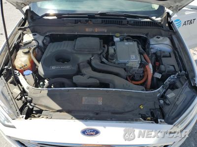 Zdjęcie 11 z 12 samochodu: 2018 FORD FUSION SE HYBRID VIN:3FA6P0LU4JR152455 - miniatura