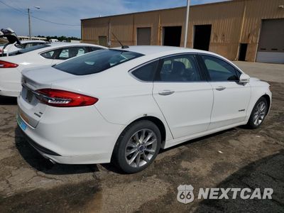 Trzecie zdjęcie samochodu z tyłu: 2017 FORD FUSION SE HYBRID VIN:3FA6P0LU2HR409543 - miniatura