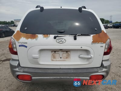 Zdjęcie 6 z 15 samochodu: 2002 HYUNDAI SANTA FE GLS VIN:KM8SC13D92U292632 - miniatura