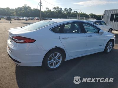 Trzecie zdjęcie samochodu z tyłu: 2018 FORD FUSION SE HYBRID VIN:3FA6P0LU2JR281911 - miniatura