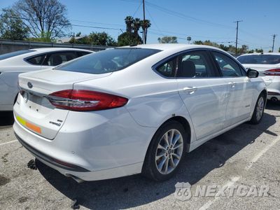 Trzecie zdjęcie samochodu z tyłu: 2017 FORD FUSION SE HYBRID VIN:3FA6P0LU8HR409370 - miniatura
