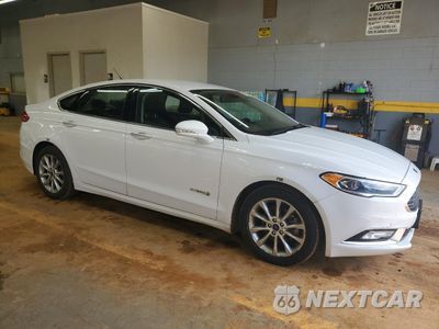 Czwarte zdjęcie samochodu z boku: 2017 FORD FUSION SE HYBRID VIN:3FA6P0LU1HR409193 - miniatura
