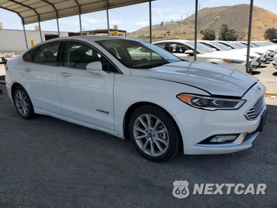 Czwarte zdjęcie samochodu z boku: 2017 FORD FUSION SE HYBRID VIN:3FA6P0LU5HR409696 - miniatura