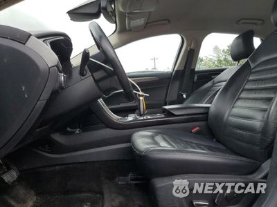 Zdjęcie 7 z 12 samochodu: 2017 FORD FUSION SE HYBRID VIN:3FA6P0LU3HR409230 - miniatura