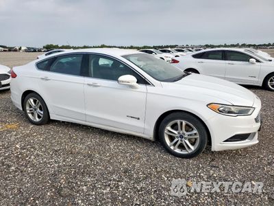 Czwarte zdjęcie samochodu z boku: 2018 FORD FUSION SE HYBRID VIN:3FA6P0LU4JR118757 - miniatura