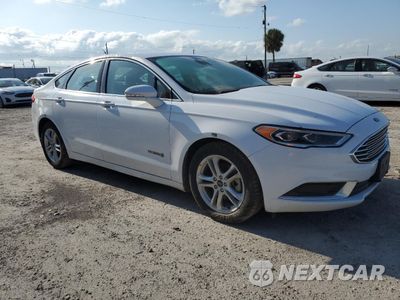Czwarte zdjęcie samochodu z boku: 2018 FORD FUSION SE HYBRID VIN:3FA6P0LU0JR163503 - miniatura