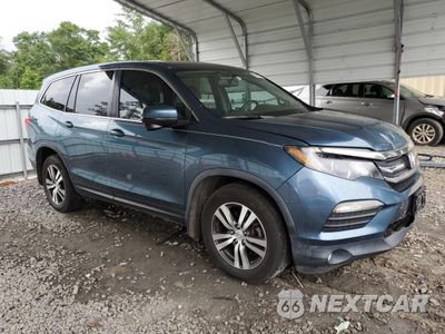 Czwarte zdjęcie samochodu z boku: 2017 HONDA PILOT EXL VIN:5FNYF5H51HB043094 - miniatura