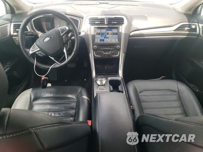 Zdjęcie 8 z 12 samochodu: 2017 FORD FUSION SE HYBRID VIN:3FA6P0LU5HR359589 - miniatura