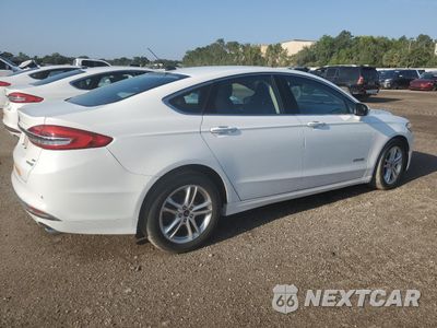 Trzecie zdjęcie samochodu z tyłu: 2018 FORD FUSION SE HYBRID VIN:3FA6P0LU9JR278701 - miniatura