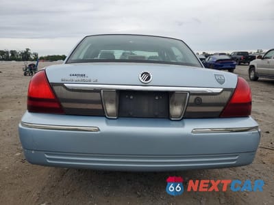 Zdjęcie 6 z 12 samochodu: 2010 MERCURY GRAND MARQUIS LS VIN:2MEBM7FV8AX635848 - miniatura