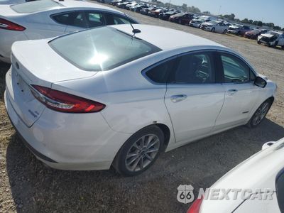 Trzecie zdjęcie samochodu z tyłu: 2017 FORD FUSION SE HYBRID VIN:3FA6P0LU7HR409361 - miniatura
