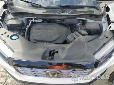 Zdjęcie 12 z 15 samochodu: 2022 HONDA PASSPORT TRAIL SPORT VIN:5FNYF8H66NB016477 - miniatura