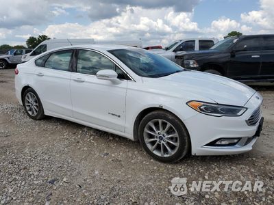 Czwarte zdjęcie samochodu z boku: 2017 FORD FUSION SE HYBRID VIN:3FA6P0LU5HR409102 - miniatura