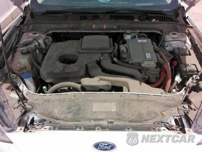 Zdjęcie 11 z 13 samochodu: 2017 FORD FUSION SE HYBRID VIN:3FA6P0LUZHR410061 - miniatura