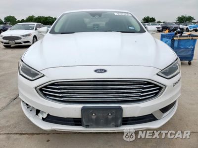 Piąte zdjęcie samochodu w środku: 2018 FORD FUSION SE HYBRID VIN:3FA6P0LU6JR171881 - miniatura