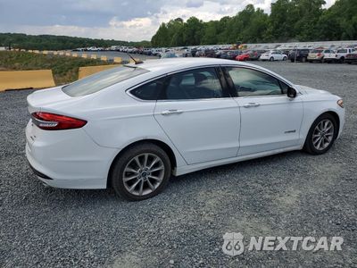 Trzecie zdjęcie samochodu z tyłu: 2017 FORD FUSION SE HYBRID VIN:3FA6P0LU1HR409680 - miniatura