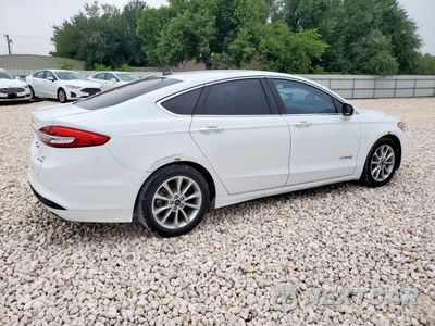 Trzecie zdjęcie samochodu z tyłu: 2017 FORD FUSION SE HYBRID VIN:3FA6P0LU2HR409168 - miniatura