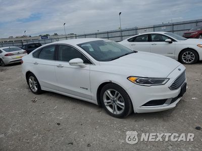 Czwarte zdjęcie samochodu z boku: 2018 FORD FUSION SE HYBRID VIN:3FA6P0LU5JR129914 - miniatura