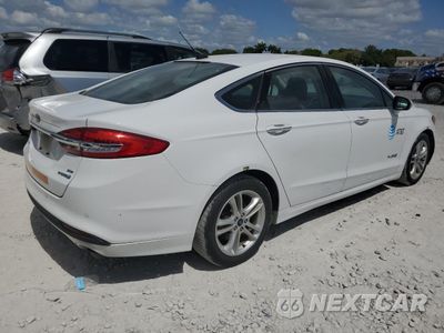 Trzecie zdjęcie samochodu z tyłu: 2018 FORD FUSION SE HYBRID VIN:3FA6P0LU4JR118600 - miniatura