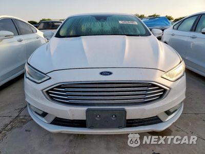 Piąte zdjęcie samochodu w środku: 2017 FORD FUSION SE HYBRID VIN:3FA6P0LU7HR409649 - miniatura