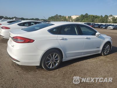 Trzecie zdjęcie samochodu z tyłu: 2017 FORD FUSION SE HYBRID VIN:3FA6P0LU5HR409567 - miniatura