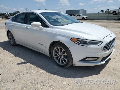 Czwarte zdjęcie samochodu z boku: 2017 FORD FUSION SE HYBRID VIN:3FA6P0LU5HR408953 - miniatura