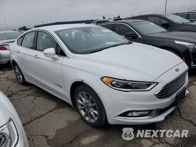 Czwarte zdjęcie samochodu z boku: 2017 FORD FUSION SE HYBRID VIN:3FA6P0LU2HR359548 - miniatura
