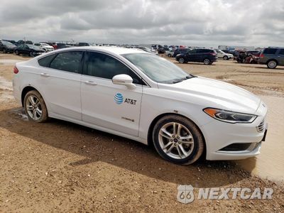 Czwarte zdjęcie samochodu z boku: 2018 FORD FUSION SE HYBRID VIN:3FA6P0LU9JR171664 - miniatura