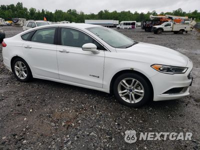 Czwarte zdjęcie samochodu z boku: 2018 FORD FUSION SE HYBRID VIN:3FA6P0LU9JR152449 - miniatura
