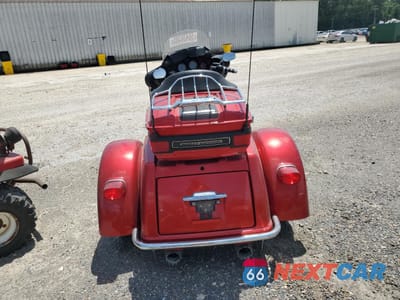 Czwarte zdjęcie samochodu z boku: 2012 HARLEY-DAVIDSON FLHTCUTG TRI GLIDE ULTRA CLASSIC VIN:1HD1MAM11CB855959 - miniatura