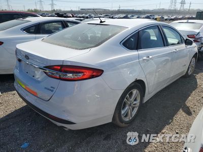 Trzecie zdjęcie samochodu z tyłu: 2018 FORD FUSION SE HYBRID VIN:3FA6P0LU8JR172059 - miniatura