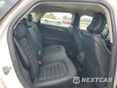 Zdjęcie 10 z 13 samochodu: 2018 FORD FUSION SE HYBRID VIN:3FA6P0LU5JR172021 - miniatura