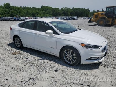Czwarte zdjęcie samochodu z boku: 2017 FORD FUSION SE HYBRID VIN:3FA6P0LU6HR409660 - miniatura