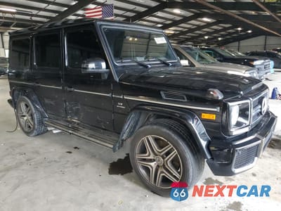 Czwarte zdjęcie samochodu z boku: 2016 MERCEDES-BENZ G 63 AMG VIN:WDCYC7DF3GX259692 - miniatura