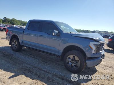 Czwarte zdjęcie samochodu z boku: 2023 FORD F150 LIGHTNING PRO VIN:1FT6W1EVXPWG53591 - miniatura