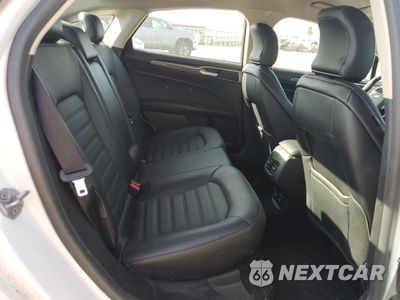 Zdjęcie 10 z 13 samochodu: 2017 FORD FUSION SE HYBRID VIN:3FA6P0LUXHR400752 - miniatura