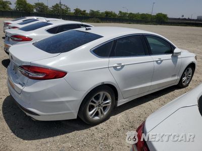 Trzecie zdjęcie samochodu z tyłu: 2018 FORD FUSION SE HYBRID VIN:3FA6P0LU4JR171572 - miniatura