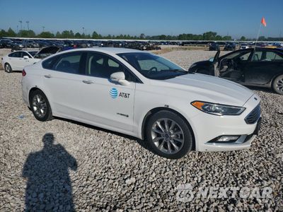 Czwarte zdjęcie samochodu z boku: 2017 FORD FUSION SE HYBRID VIN:3FA6P0LUXHR408902 - miniatura