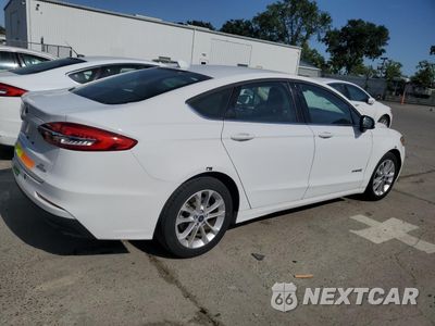 Trzecie zdjęcie samochodu z tyłu: 2019 FORD FUSION SE VIN:3FA6P0LU6KR263994 - miniatura
