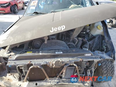 Zdjęcie 11 z 13 samochodu: 1997 JEEP GRAND CHEROKEE LAREDO VIN:1J4GZ58S1VC707714 - miniatura