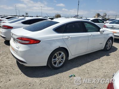 Trzecie zdjęcie samochodu z tyłu: 2018 FORD FUSION SE HYBRID VIN:3FA6P0LU6JR171573 - miniatura